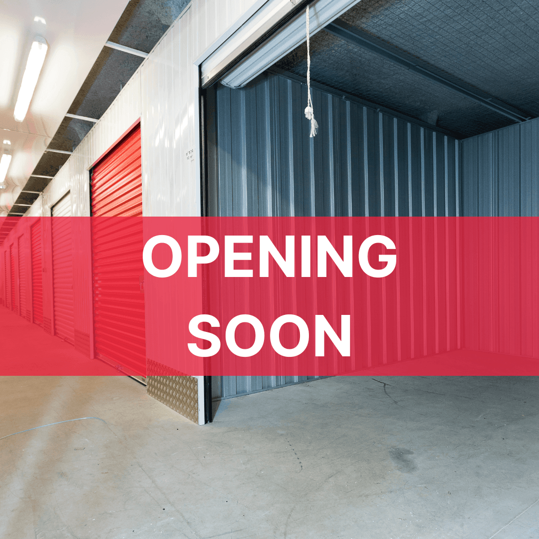 Interior corridor of new storage units with Opening Soon banner overlay at HOMEBOX Humanes, Calle Plomo 5, Humanes de Madrid