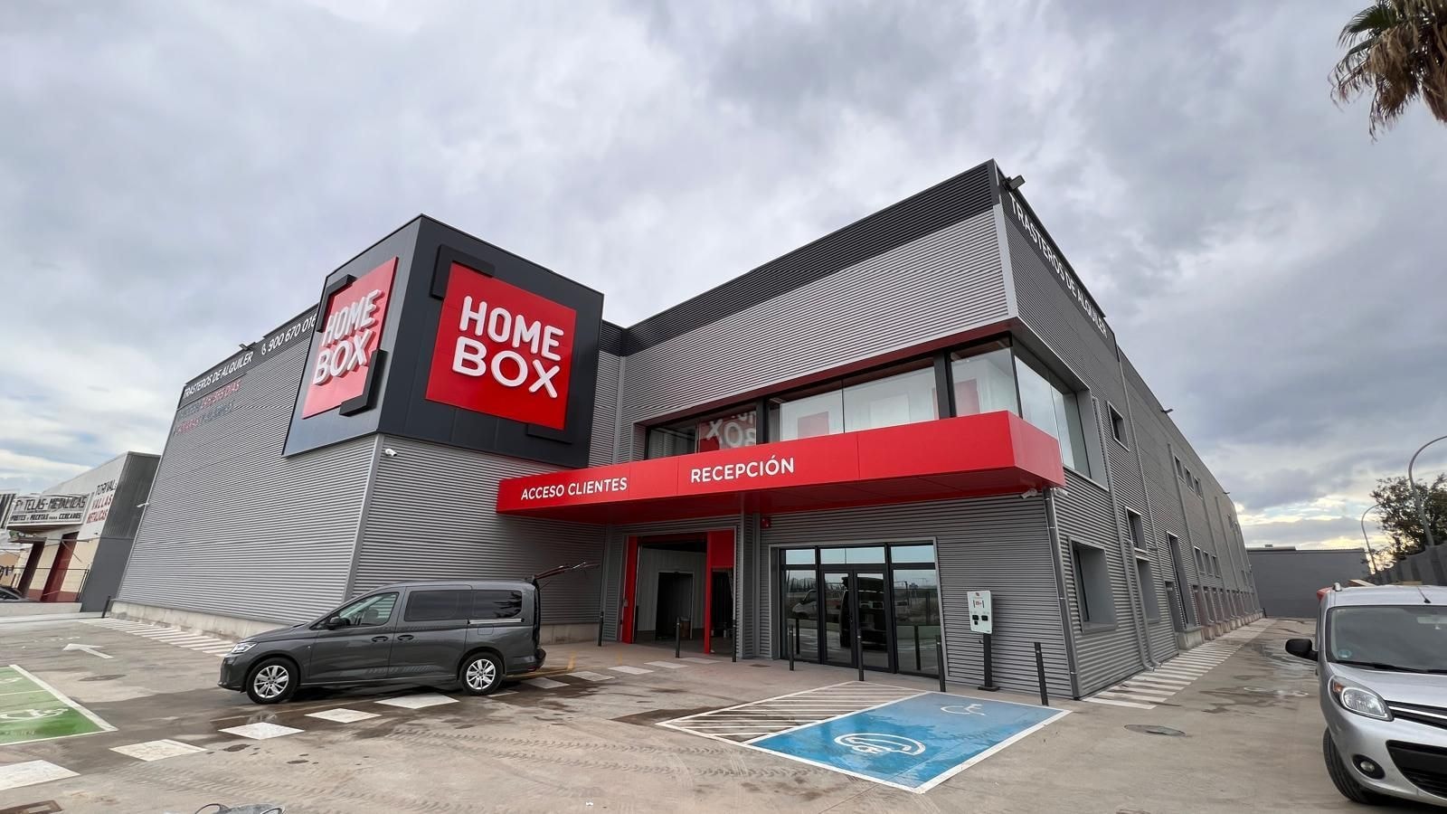 Modern HOMEBOX building exterior with client access and reception signage at HOMEBOX Valencia, Avng Comarques del Pais Valencía 61, Quart de Poblet